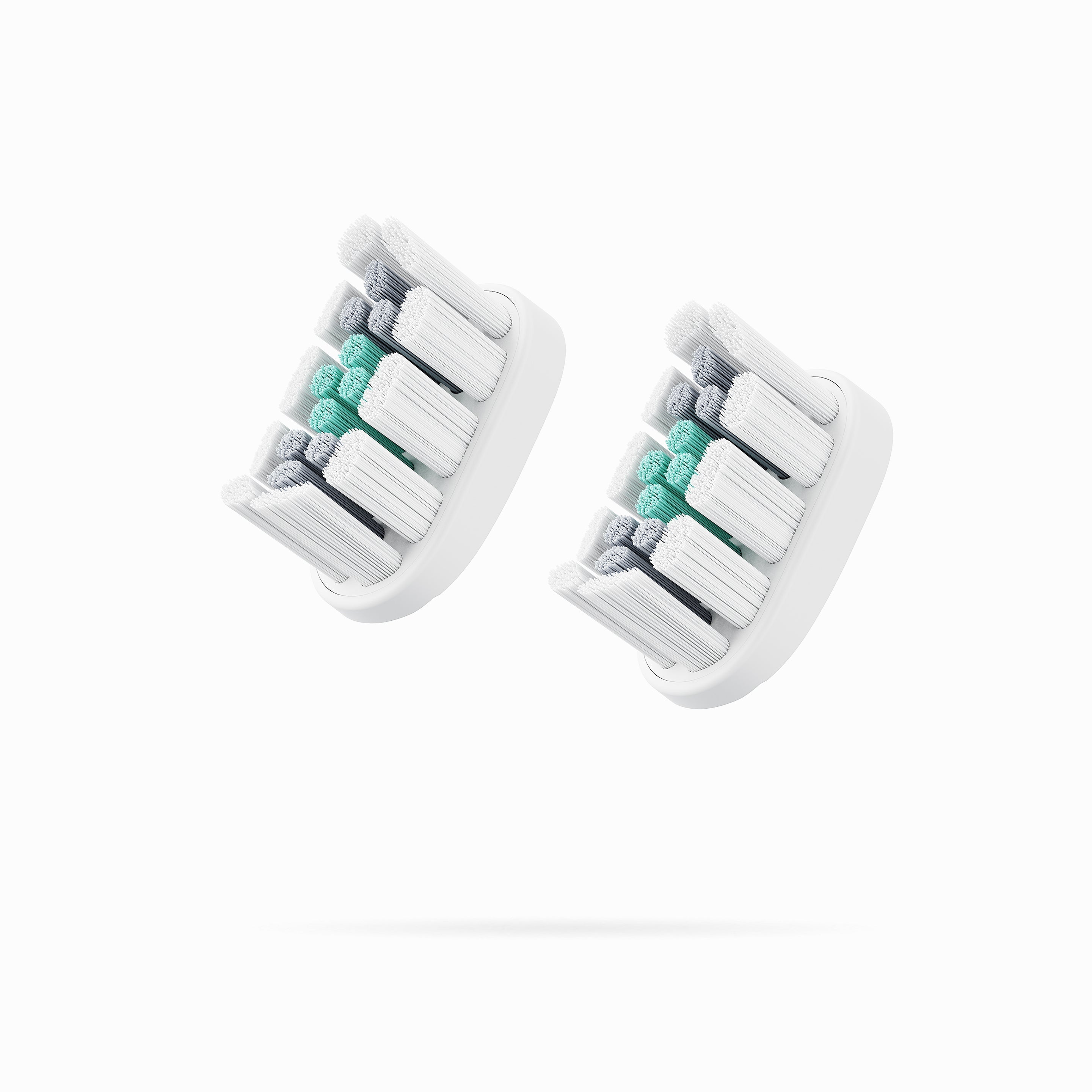Two toothbrush heads with a striped pattern on a white background