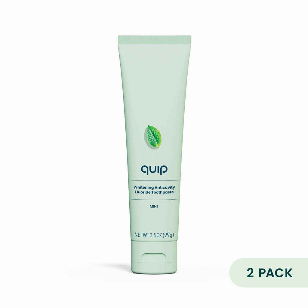 Quip mint toothpaste tube on a white background with '2 Pack' label.