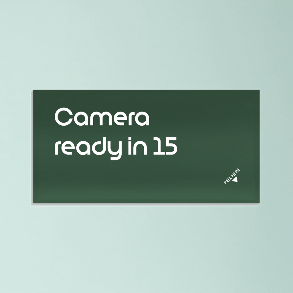 Green card with the text ‘Camera ready in 15’ against a light mint background.
