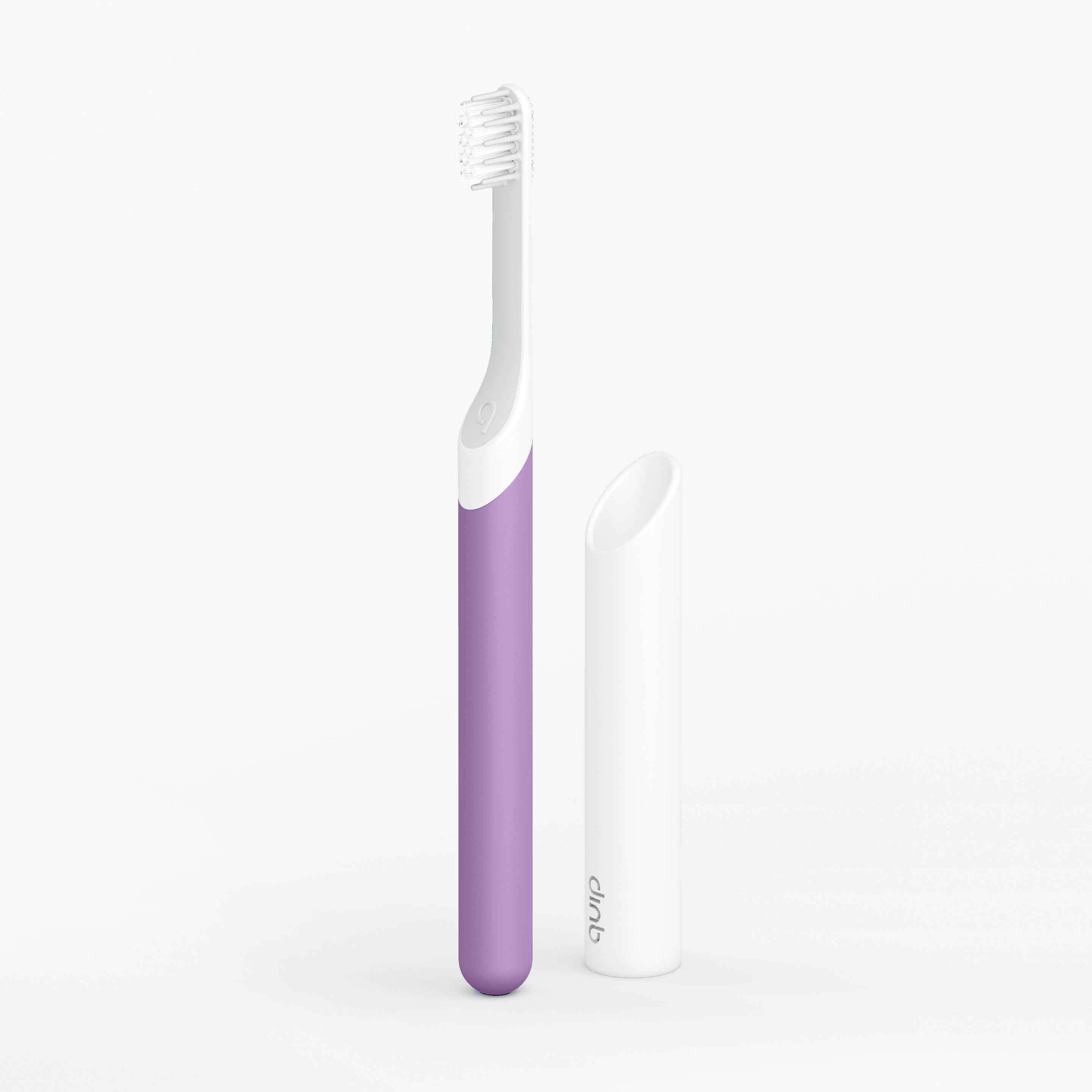 Purple and white toothbrush on a light gray background