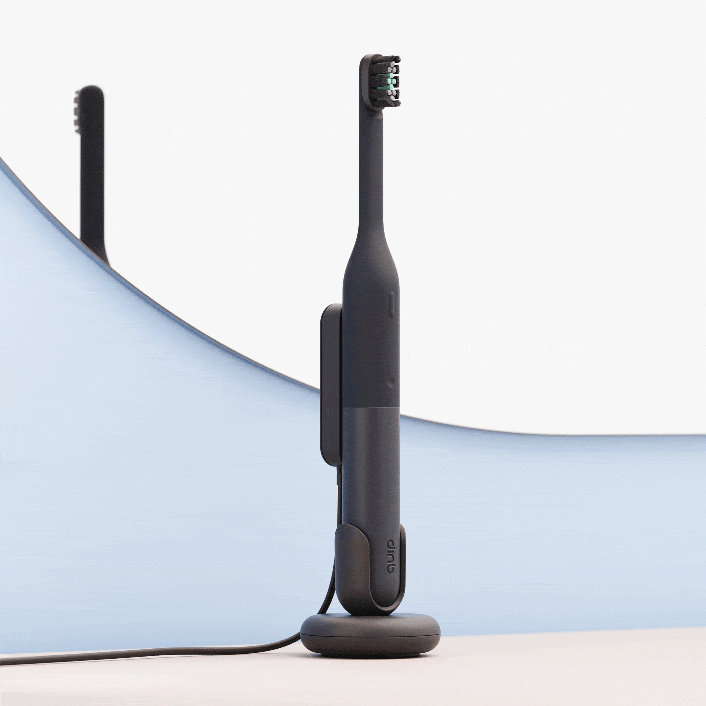 A sleek black electric toothbrush standing upright on a matching charging base, set against a soft blue and white curved background with its reflection visible behind it.