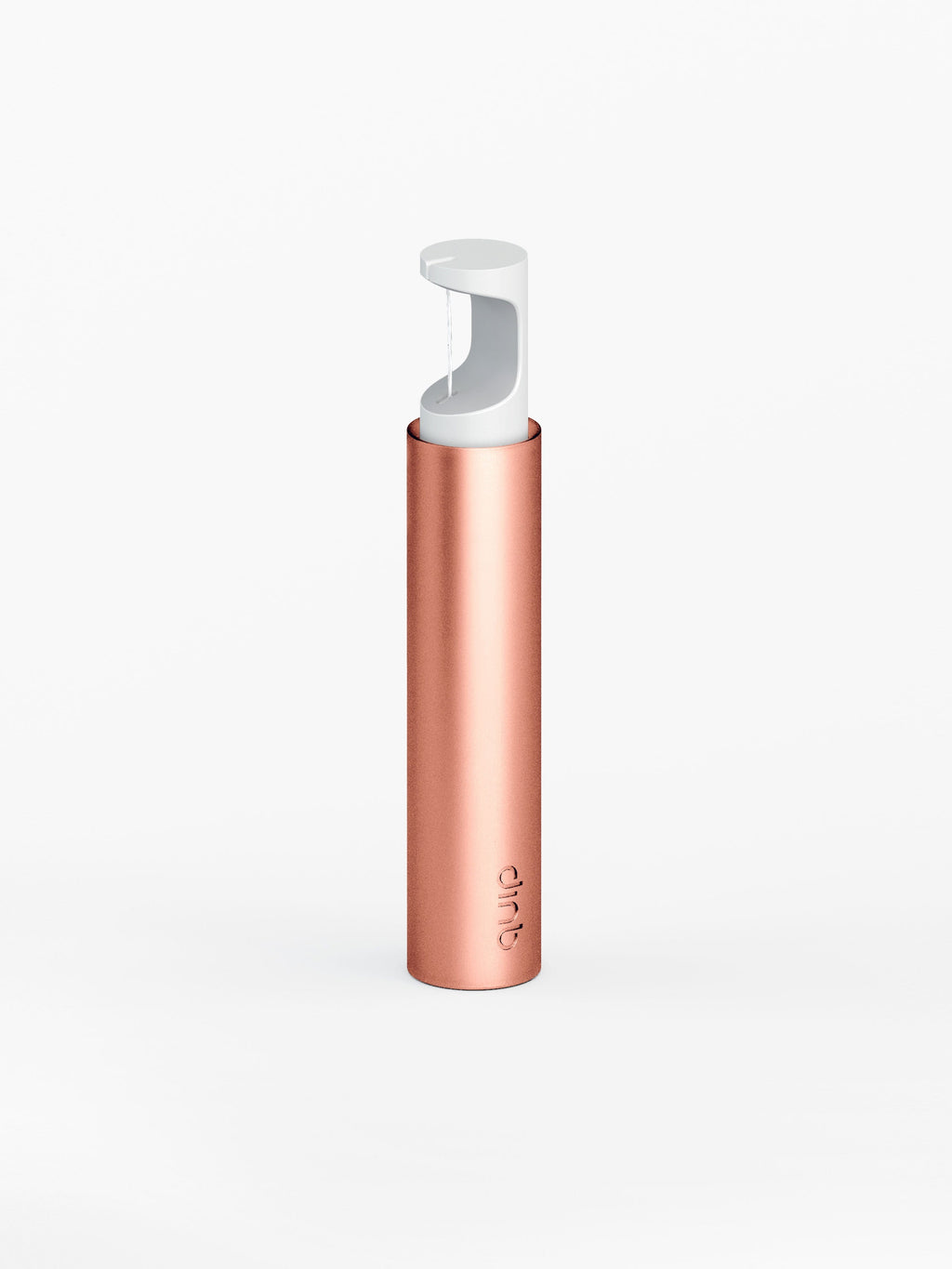 A rose gold colored refillable dispenser for floss string with a pop-up top.