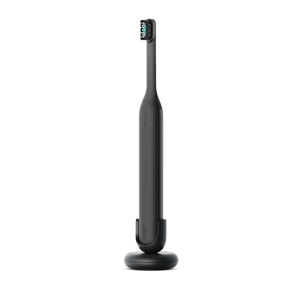 Ultra™ Next Generation Smart Sonic Electric Toothbrush in Onyx color, displayed upright on its matching black stand.
